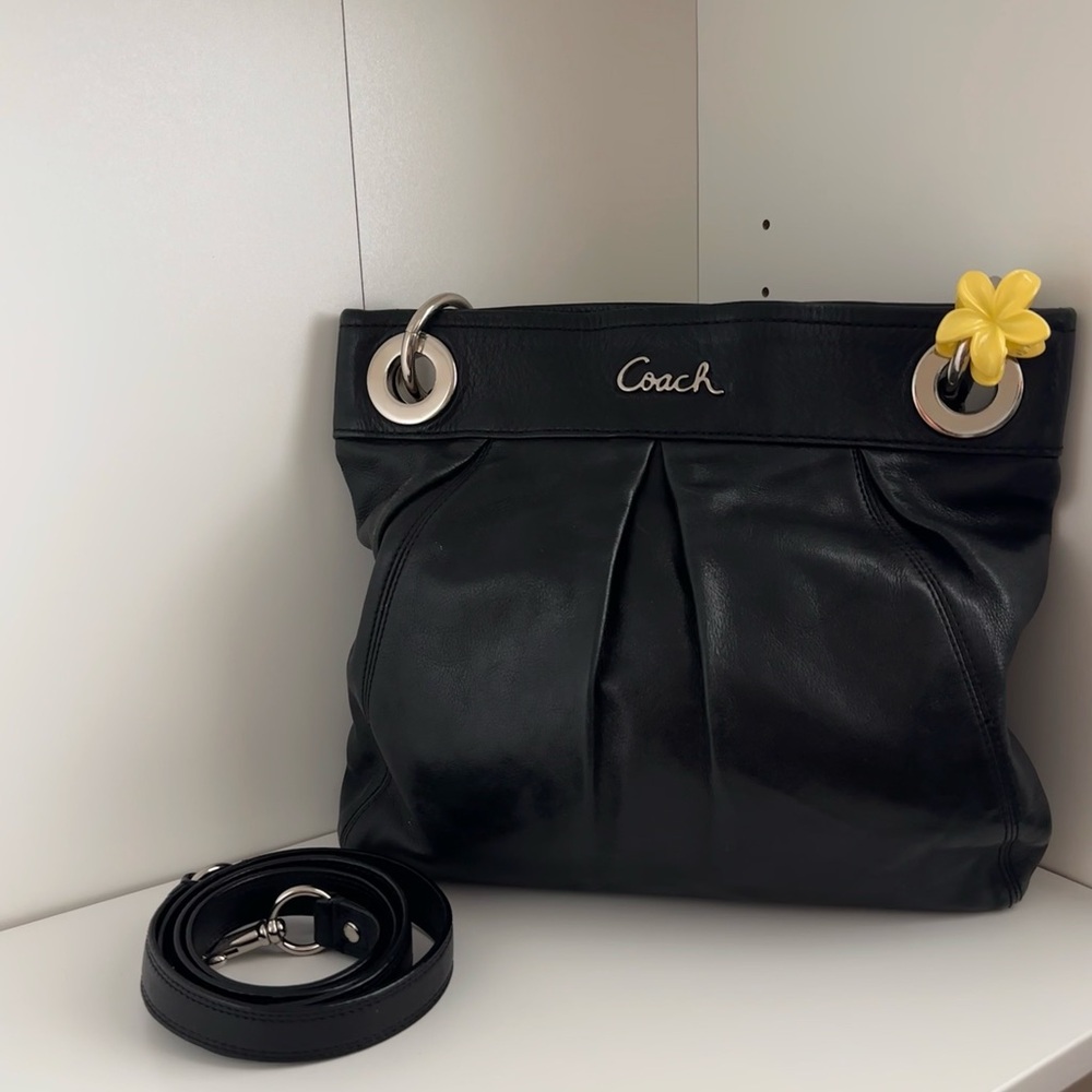 black leather Coach Ashley Hippie shoulder bag featuring silver-tone hardware.